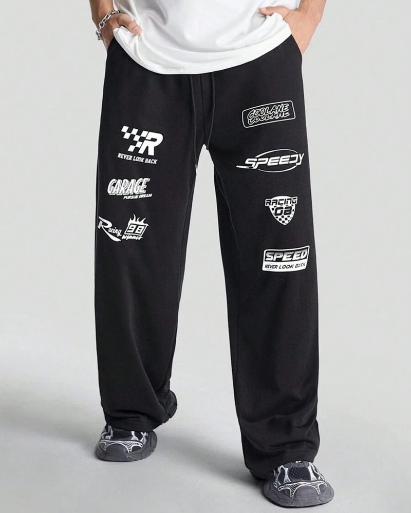 فلاينوف بنطلون رياضي رجالي أسود مطبوع بقصة فضفاضة - Image 1